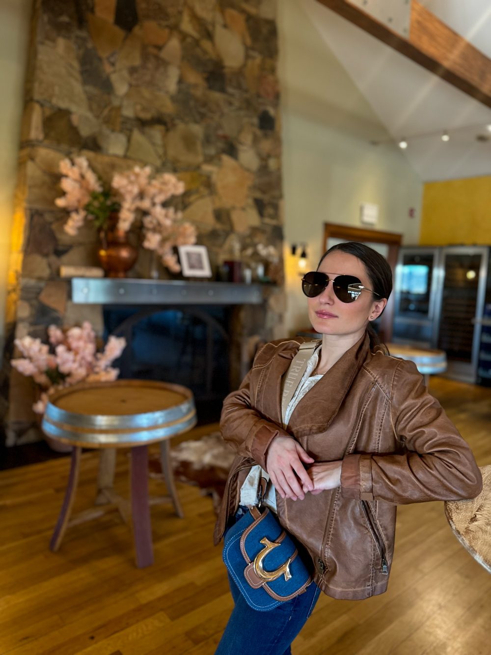 spring style in denim and light leather jacket at long island vineyard macari winery