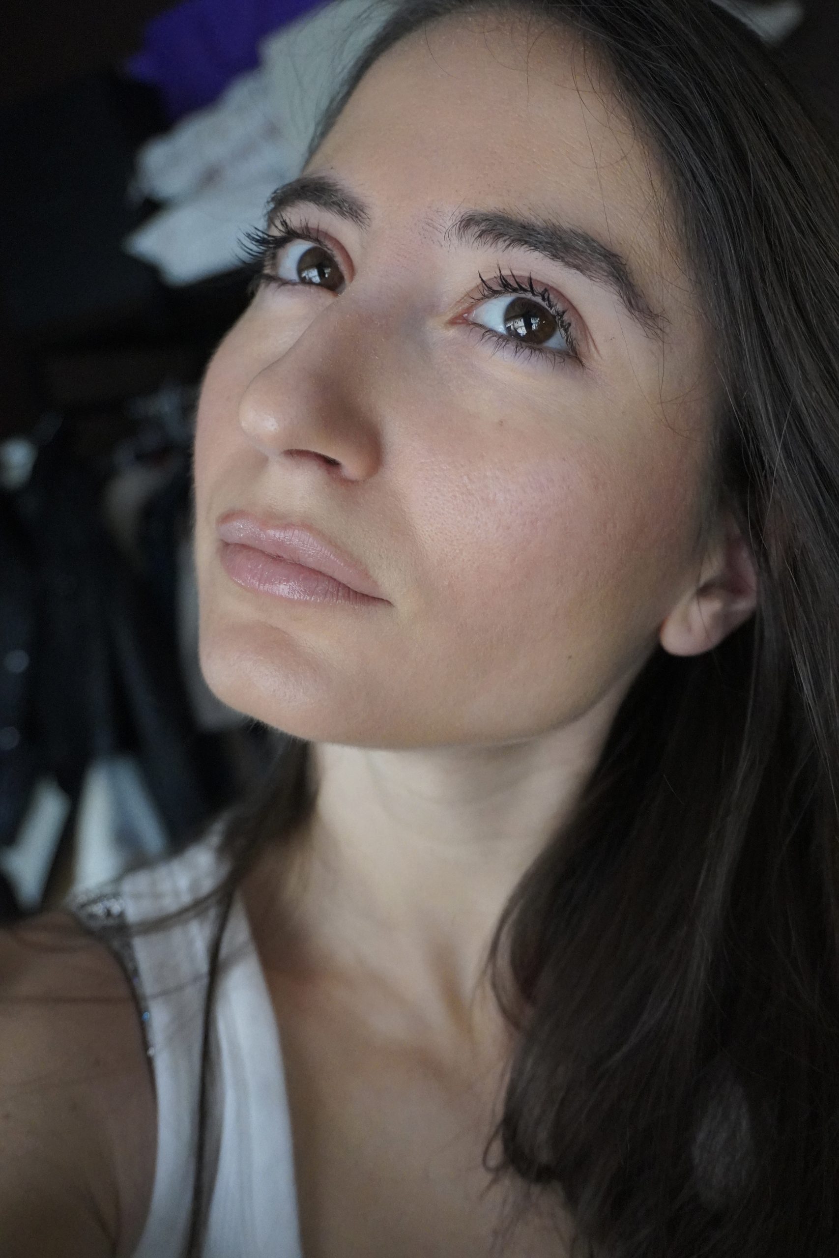 Hourglass Illusion Luminous Glow Foundation SPF 30 in shade 10 worn on skin, showing luminous finish and medium coverage for normal to dry skin